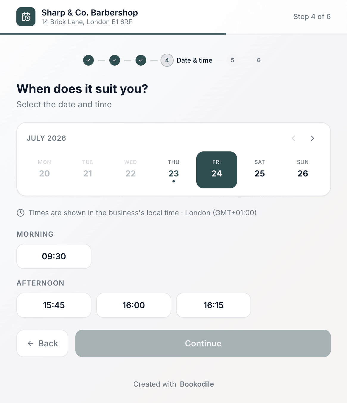 Date and time step with a week picker, timezone note and available slots