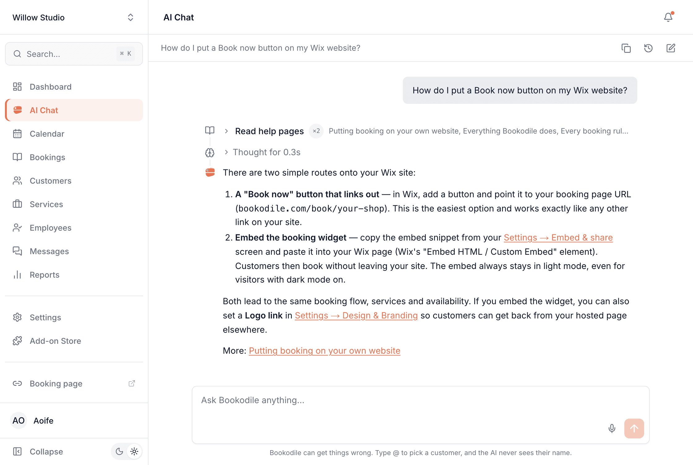 AI Chat explaining two ways to add booking to a Wix site β a button linking to the booking page, or the embedded widget β with links to the settings and the help page