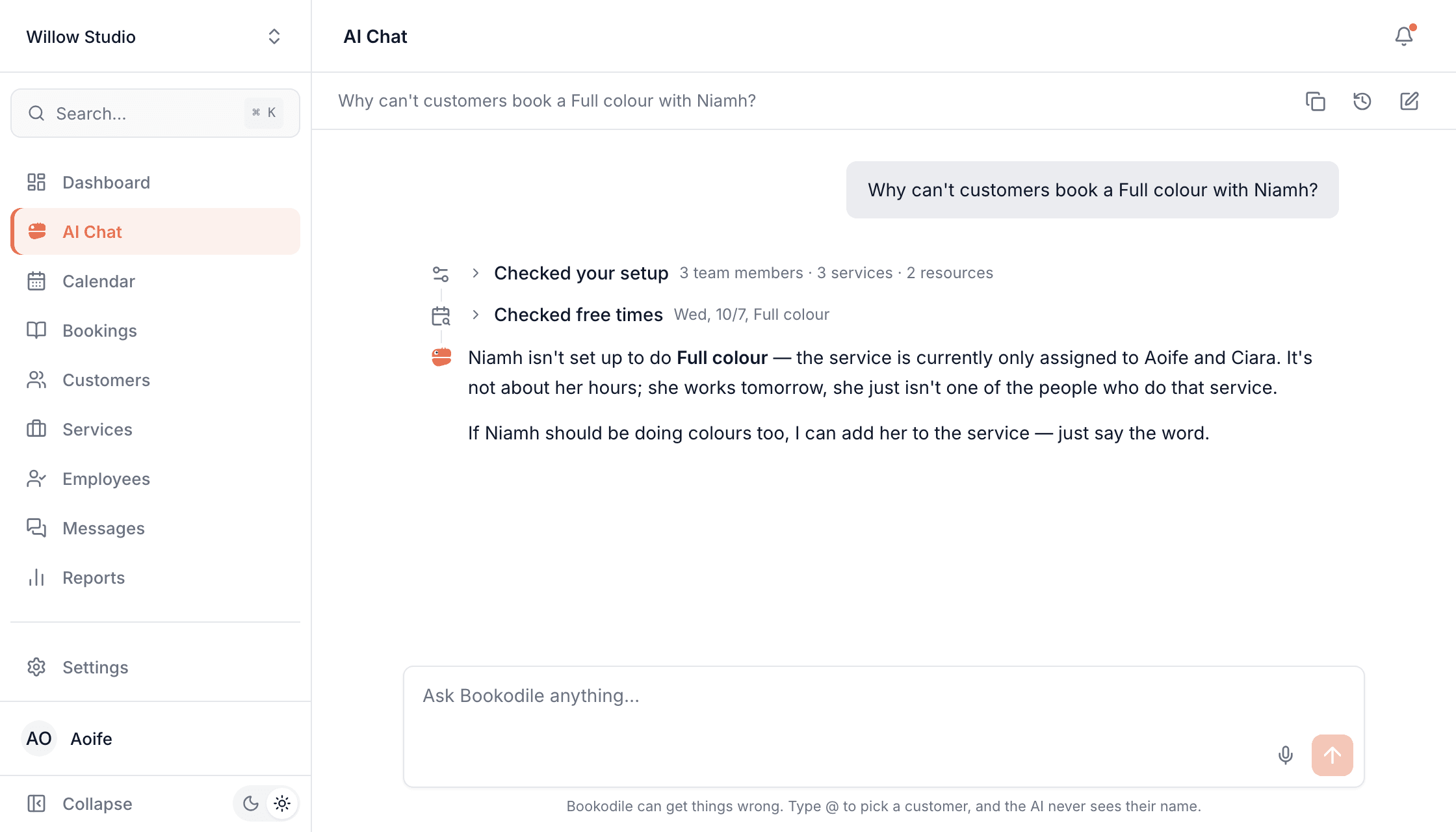 AI Chat explaining that Niamh can't be booked for Full colour because the service is only assigned to Aoife and Ciara, and offering to add her