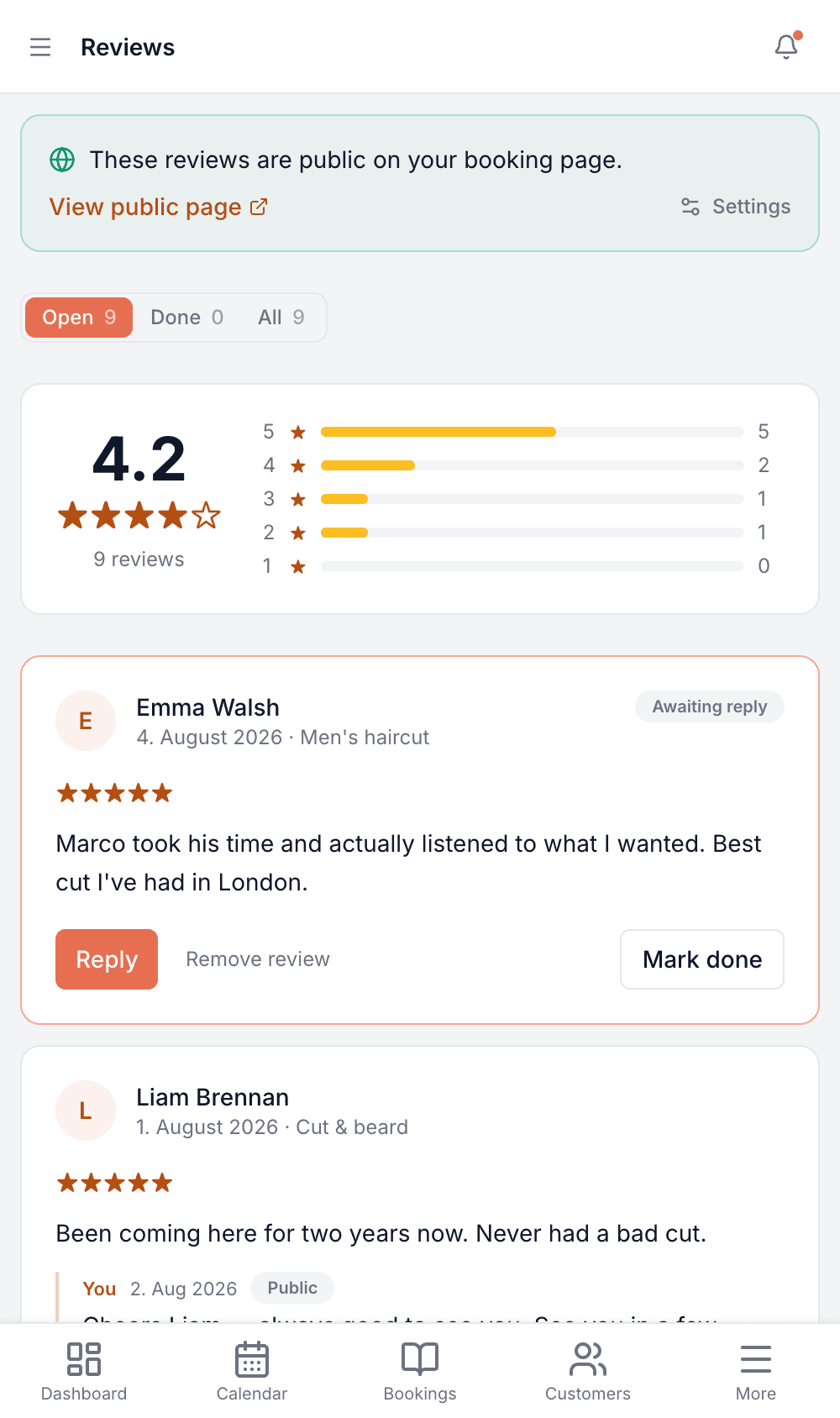 The Reviews screen on a phone showing the rating summary, the Open/Done tabs and a review with Reply and Mark done